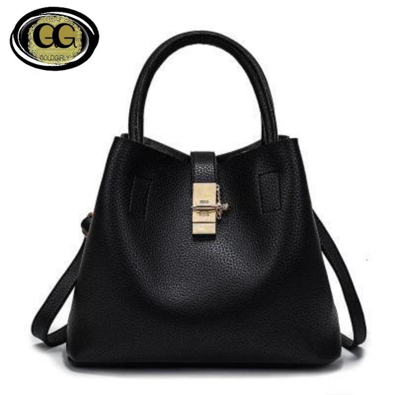Sac à main souple en cuir artificiel à bandoulière de forme trapèze