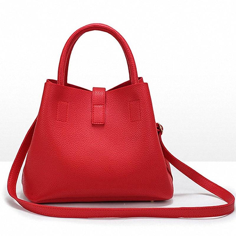 Sac à main souple en cuir artificiel à bandoulière de forme trapèze