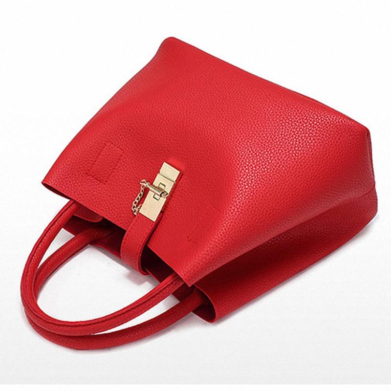 Sac à main souple en cuir artificiel à bandoulière de forme trapèze