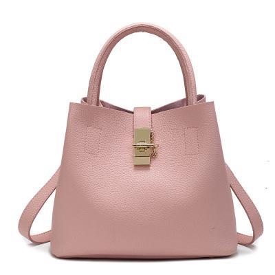 Sac à main souple en cuir artificiel à bandoulière de forme trapèze