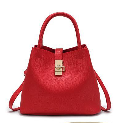 Sac à main souple en cuir artificiel à bandoulière de forme trapèze