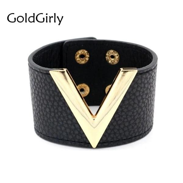 Large bracelet-manchette en cuir et métal décoré d'un V comme Victoire