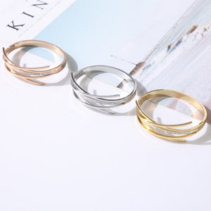 Bracelet entrecoisé classique en acier inoxydable et crystal doré- silver ou rosé