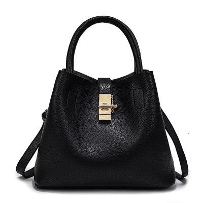 Sac à main souple en cuir artificiel à bandoulière de forme trapèze